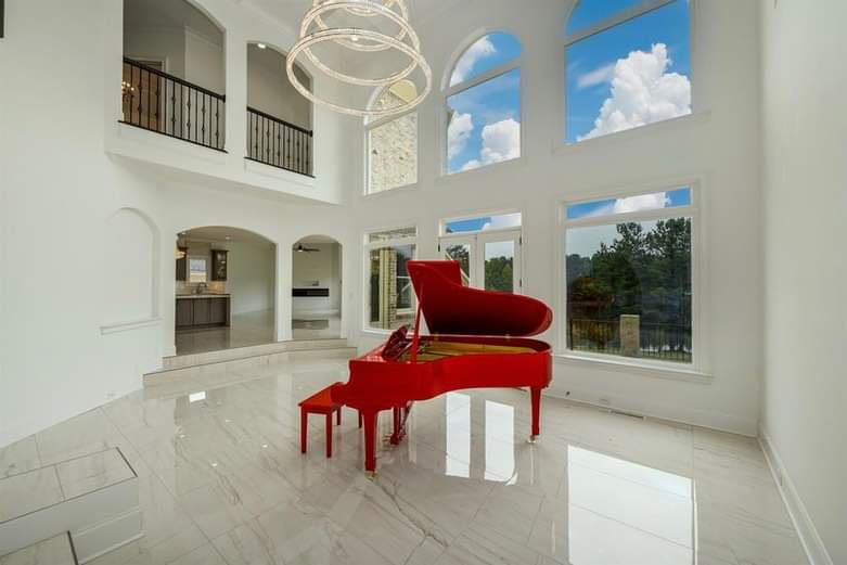 Spotless marble foyer with grand piano after deep cleaning